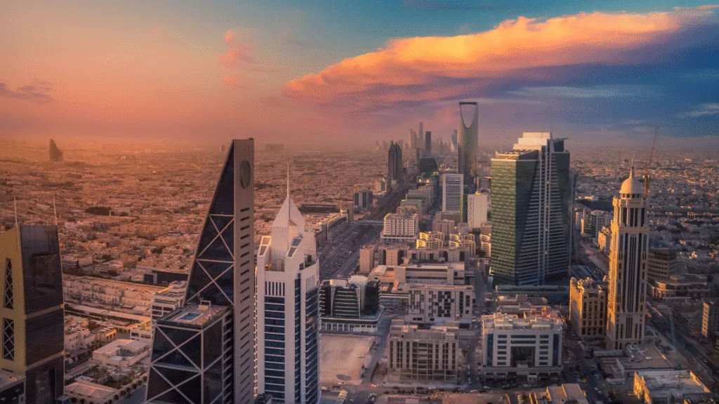 Riyadh skyline with international professionals — expatriates jobs in Saudi Arabia