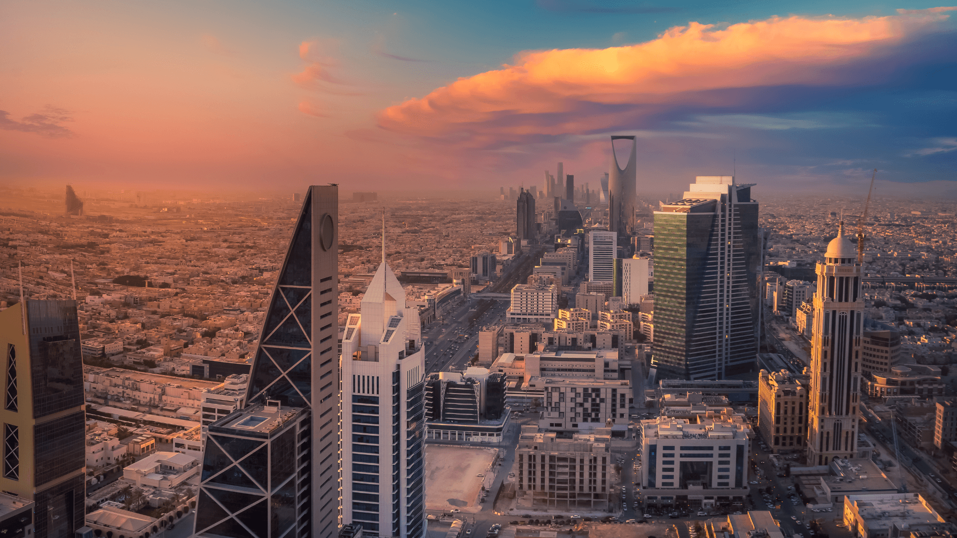 Riyadh skyline with international professionals — expatriates jobs in Saudi Arabia